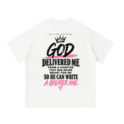 Back of white God Delivered Me oversized tee with black and pink statement print