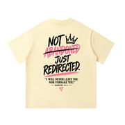 Back of apricot Not Abandoned Just Redirected oversized tee with Hebrews 13:5 statement print