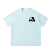 Front of sky blue God Delivered Me oversized tee with Fear No More left chest print