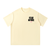 Front of apricot God Delivered Me oversized tee with Fear No More left chest print