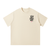 Front of mild apricot Not Abandoned Just Redirected oversized tee with Still His left chest print